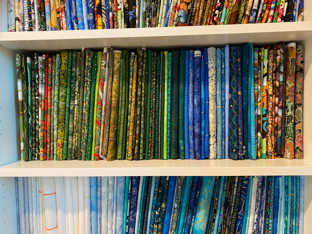 Picture of folded fabric on shelves