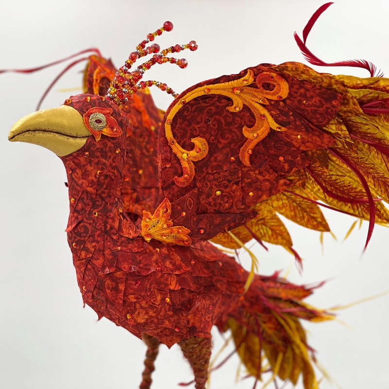 Reemergence, a textile art phoenix sculpture closeup